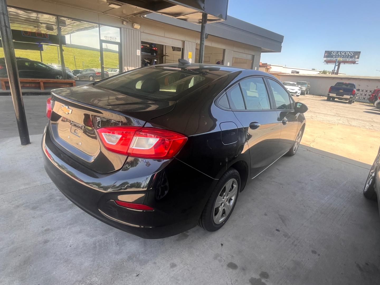 2017 BLACK CHEVROLET CRUZE LS LS Auto (1G1BC5SM1H7) with an 1.4L L4 DOHC 16V TURBO engine, 6A transmission, located at 8101 E. Skelly Dr., Tulsa, OK, 74129, (918) 592-3593, 36.121891, -95.888802 - Photo#2